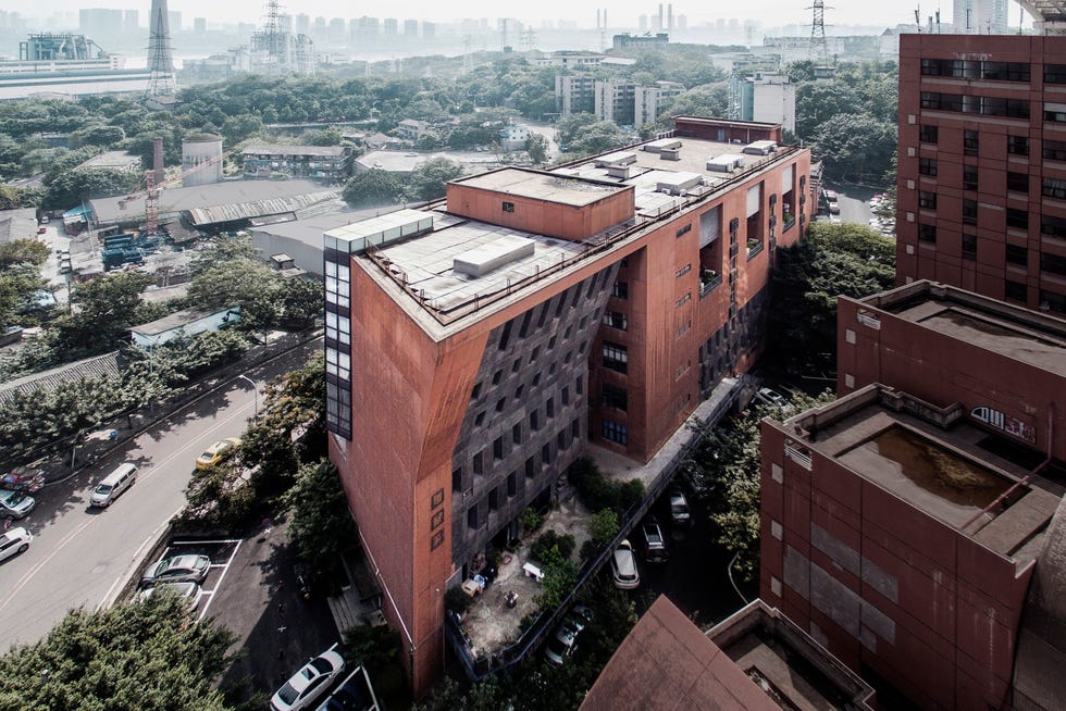 "An urban architectural design by Liu Jiakun featuring natural colors and integration with the surrounding environment."