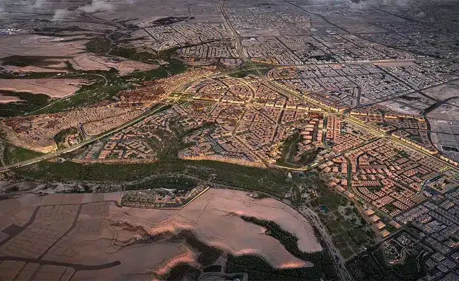 An aerial view of the futuristic Diriyah city, showcasing modern infrastructure and urban planning that blends heritage with modernity.