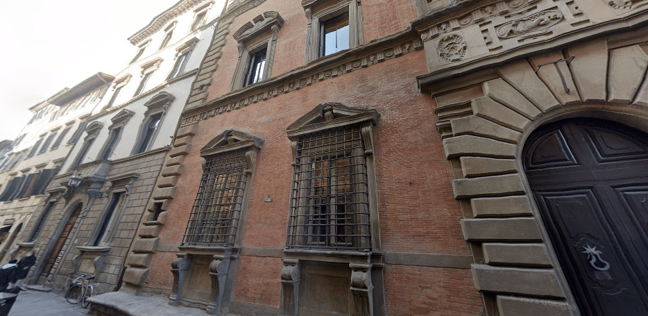Traditional Italian palace reflecting historical architecture, with iron-grated windows associated with ghostly legends.