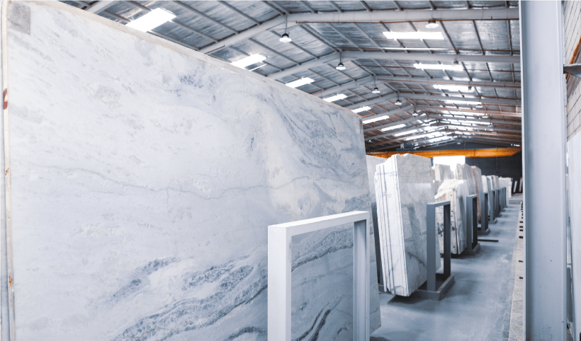 White marble slabs stored in a factory during marble manufacturing