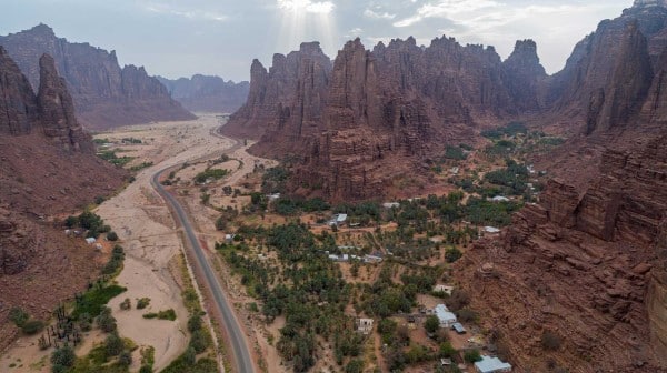 Aerial view of Wadi Disah showcasing mountains and road as part of Wadi Disah development