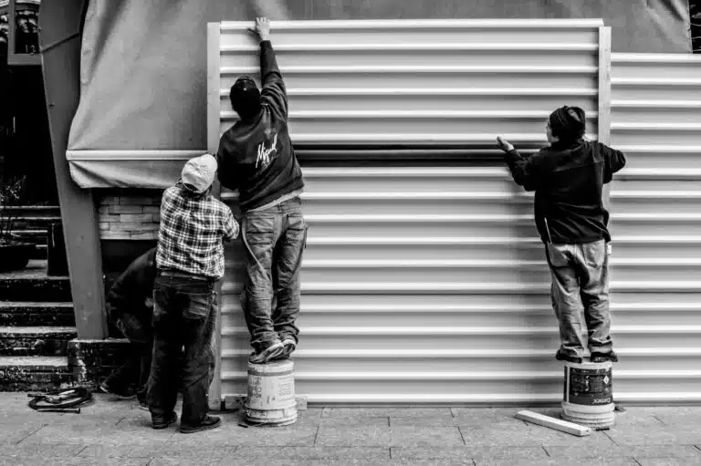 "Blue-collar workers from Generation Z in a teamwork setting on site"