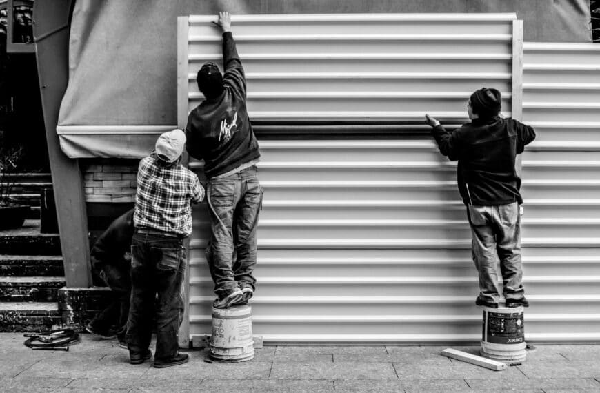 "Blue-collar workers from Generation Z in a teamwork setting on site"