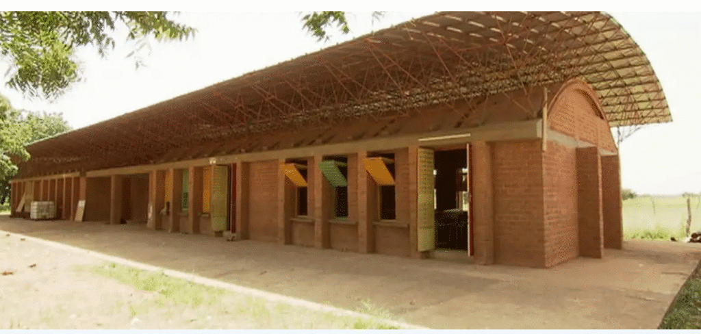 "Gando Primary School, the first architectural project by Francis Kéré using clay bricks and sustainable design."
