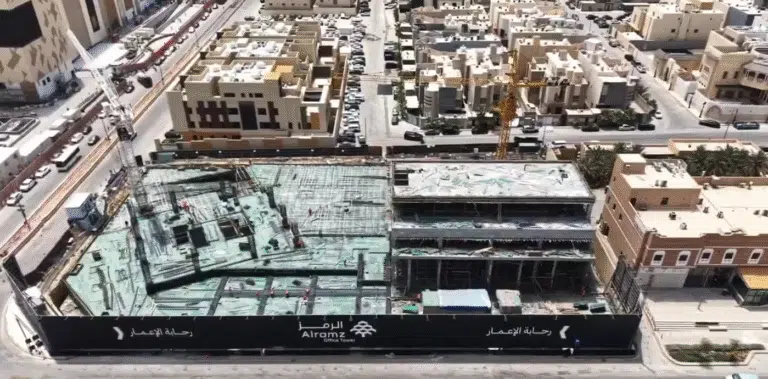 Construction site of the Alramz Office Tower in progress, showcasing the structural framework and surrounding urban development in Riyadh’s Al Malqa district