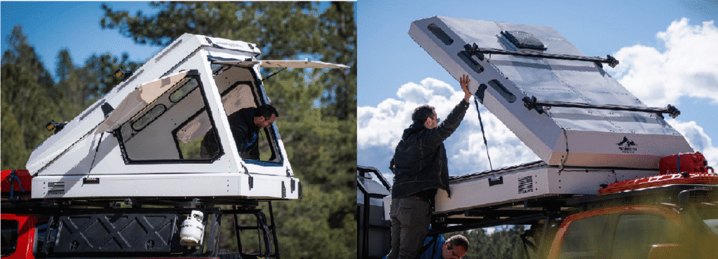 A compact camper mounted on a truck roof, manually opened to reveal a cozy interior with windows offering scenic views