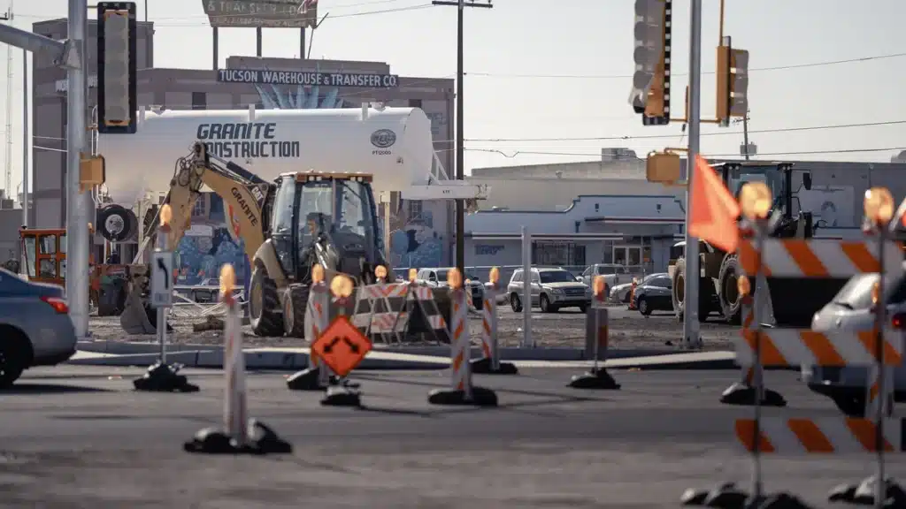 An engineering team from Granite Construction is actively working on an infrastructure project as part of the company’s efforts to expand its backlog despite economic challenges.