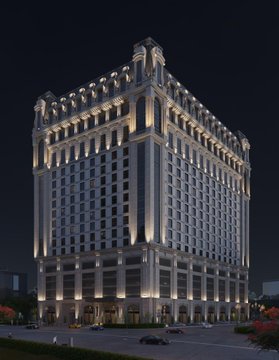 Sheraton Tower Khobar illuminated at night, showcasing its luxurious architecture