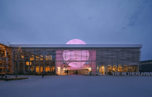 The exterior façade of the Netherlands Pavilion at Expo 2025 showcases its deconstructable engineering design, built on a massive steel structure with visible joints and fasteners—highlighting the principle of transparency in circular building engineering.