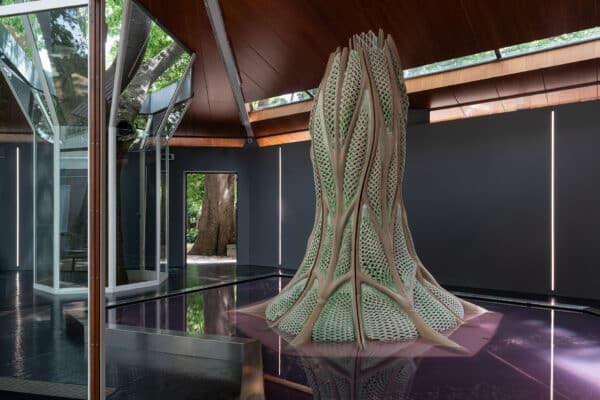 3D biofabricated architectural structures containing living cyanobacteria that absorb carbon dioxide and transform it into sustainable building materials.