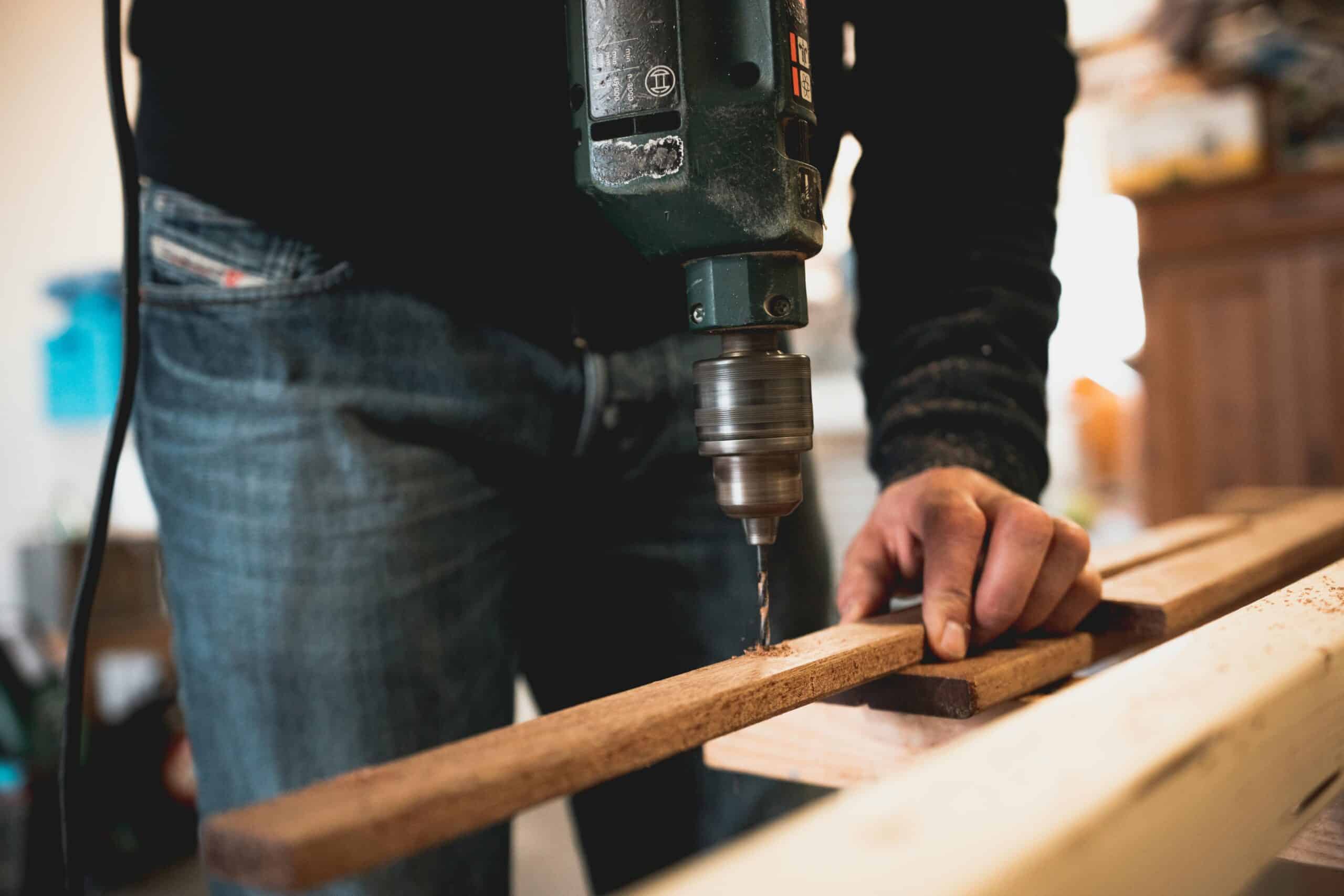 Workers installing the timber framework with precision and skill.