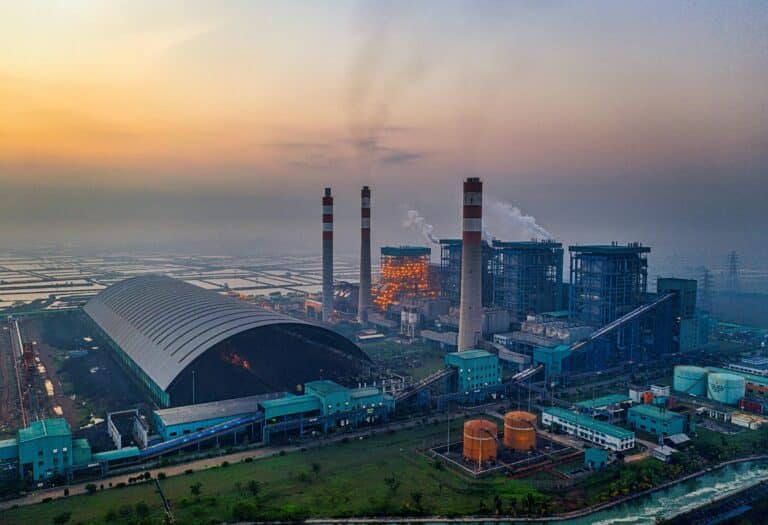 "Aerial view of a gas-fired power plant affected by carbon capture funding cancellation"
