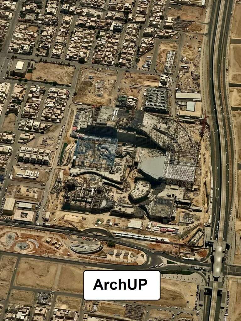 Aerial view of a bustling construction site, highlighting active development and infrastructure growth.