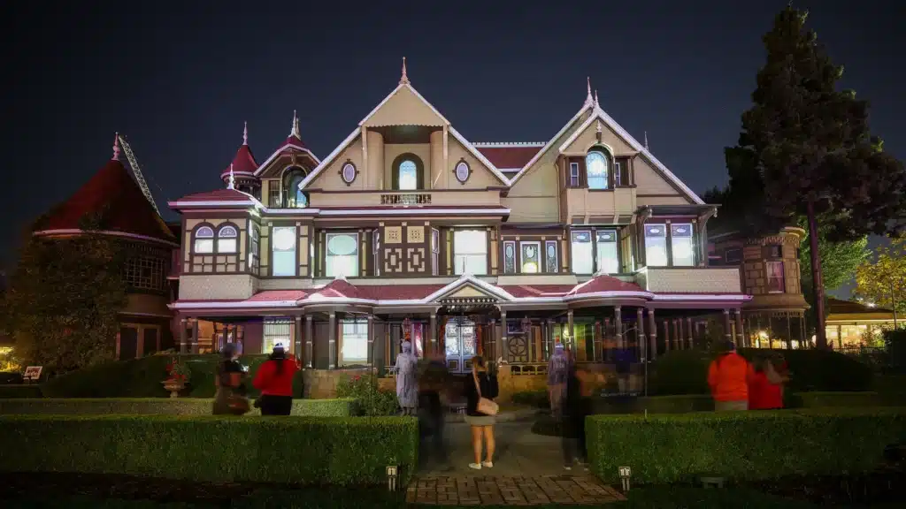 The eerie front view of Winchester House with its unusual windows and complex design