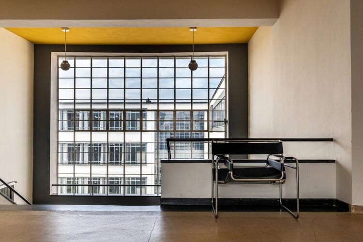 Exposed staircase inside the Bauhaus building, emphasizing functional structure without excessive decoration.