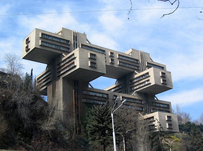 Massive concrete memorial in Croatia with a futuristic design, representing the heroic spirit of the socialist revolution.