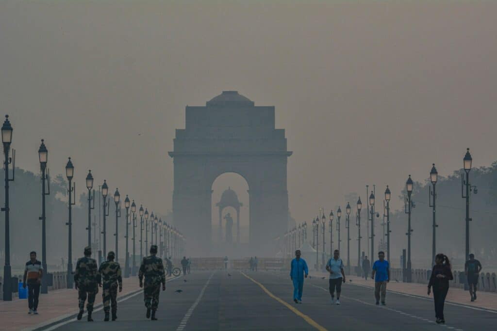 A dilapidated abandoned building under sunlight, symbolizing urban decay.