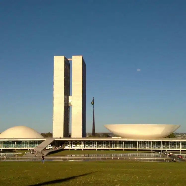 Wide view of Brasília’s government axis highlighting the precise geometric layout of buildings and surrounding green spaces.