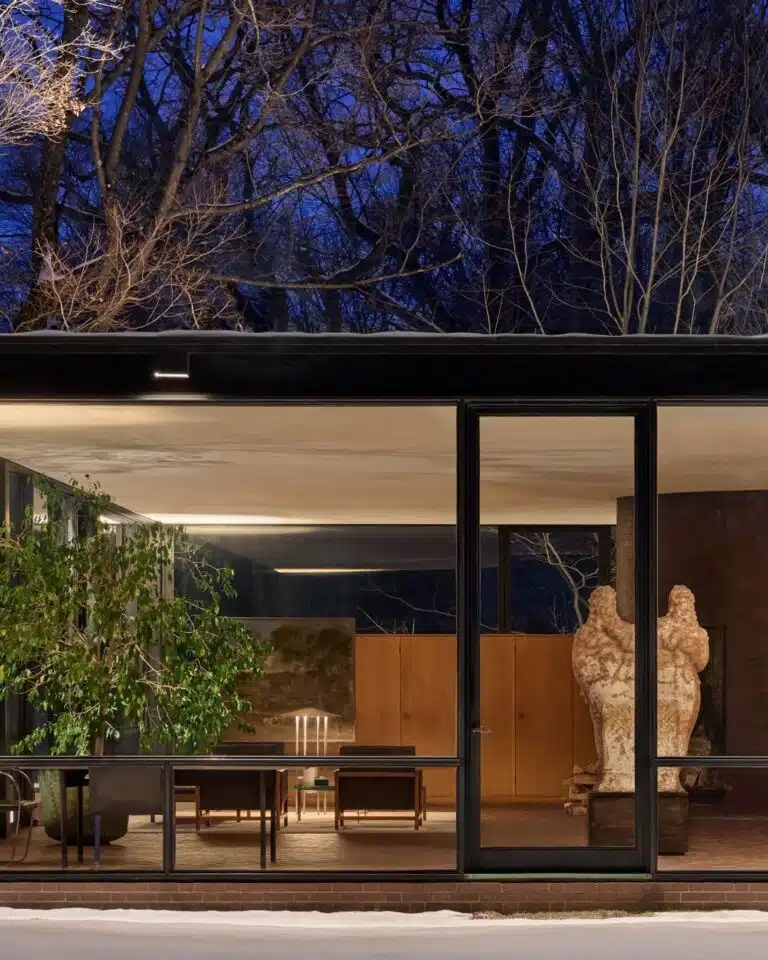 Metal lamp with cone shade and structural bottom half shown in Glass House, Connecticut