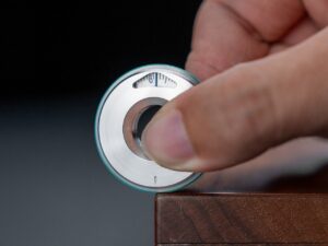 This Titanium EDC Rolling Ruler Makes Your Traditional Measuring Tape Look Pathetic