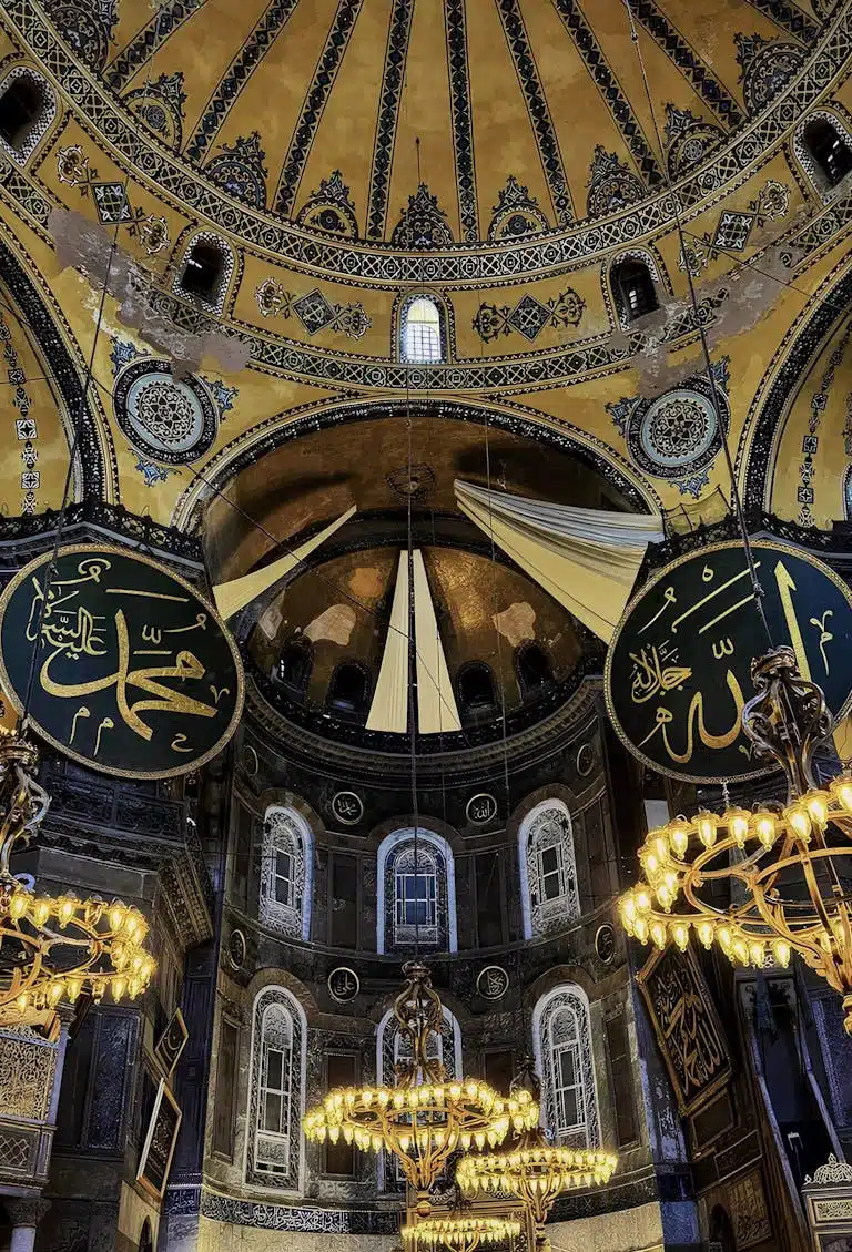 Explore the ornate interiors of Hagia Sophia, showcasing Islamic artistry in Istanbul.