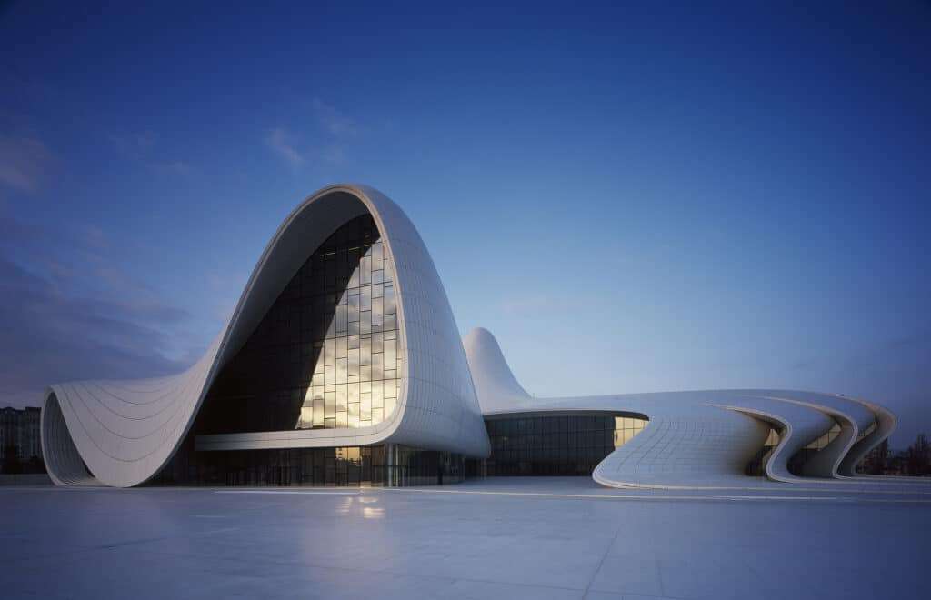The curved façade of the Heydar Aliyev Center showcases free-form, expressive architecture.