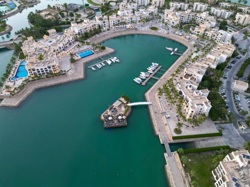 Aerial view of Hawana Salalah&rsquo;s marina and integrated coastal resort
