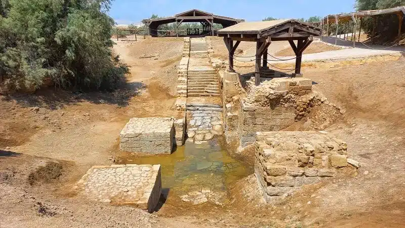 Stone ruins and heritage markers at the Baptism Site in Jordan