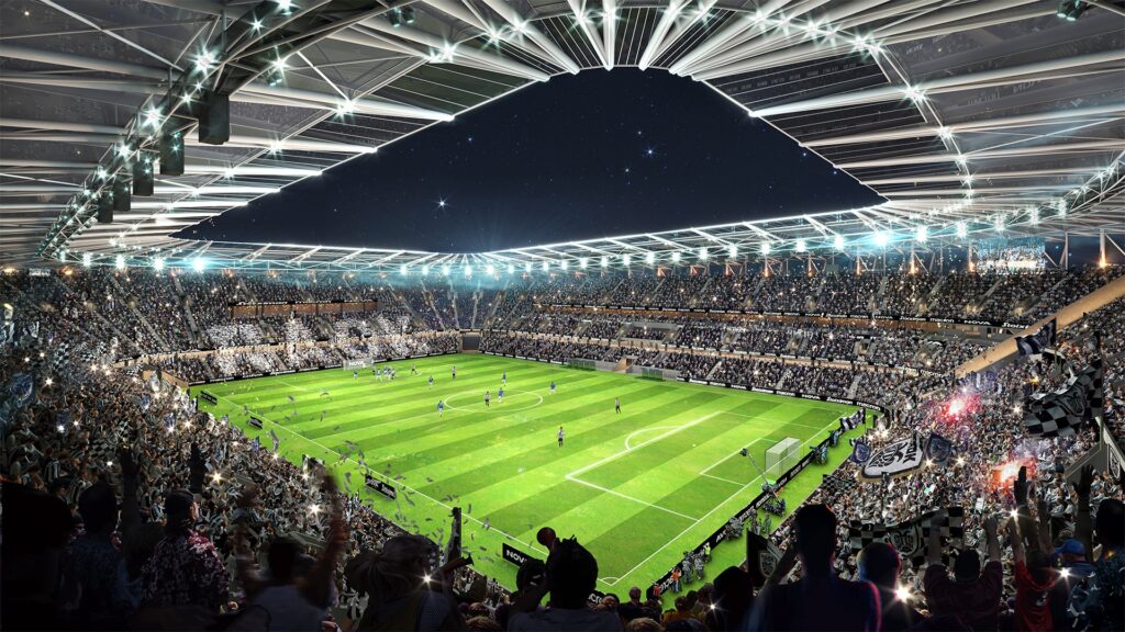 Interior stands of the stadium showing a unified seating layout that brings fans closer to the pitch.