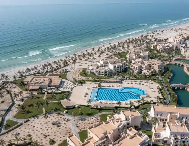 Aerial perspective of residential clusters and resorts at Hawana Salalah