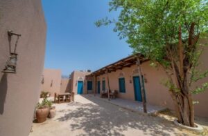 Architectural view of a Sharjah eco-luxury retreat showcasing integration of built form with natural landscape