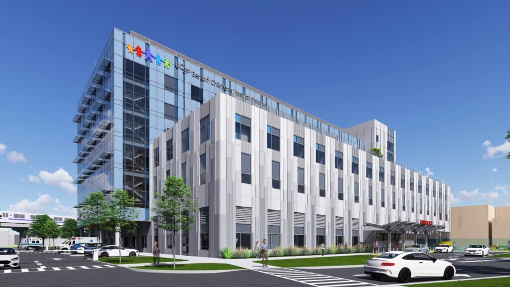 Exterior design of UCSF Benioff Children&rsquo;s Hospital in Oakland showing modern fa&ccedil;ade and wide glass panels.
