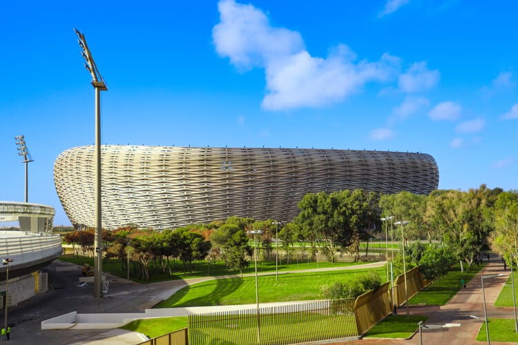 Exterior view of Prince Moulay Abdellah Stadium with a modern and fluid architectural design