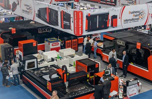 Main exhibition hall with organized booths and open visitor circulation spaces