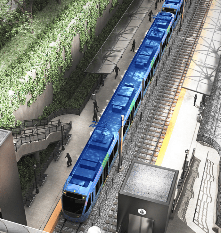 تصميم تخيلي لمحطة سكك خفيفة على خط Interborough Express في بروكلين يبرز دمج المسار مع النسيج العمراني.