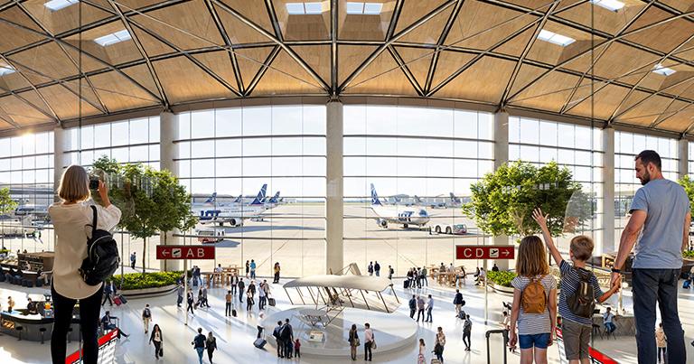 Interior of the CPK airport terminal with natural light and open passenger areas