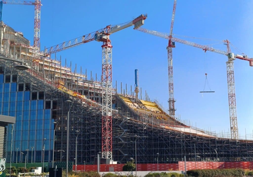 Construction site with scaffolding and vertical works