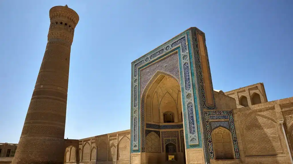 Entrance of Khwaja Kalon Mosque blending Islamic architecture with contemporary art