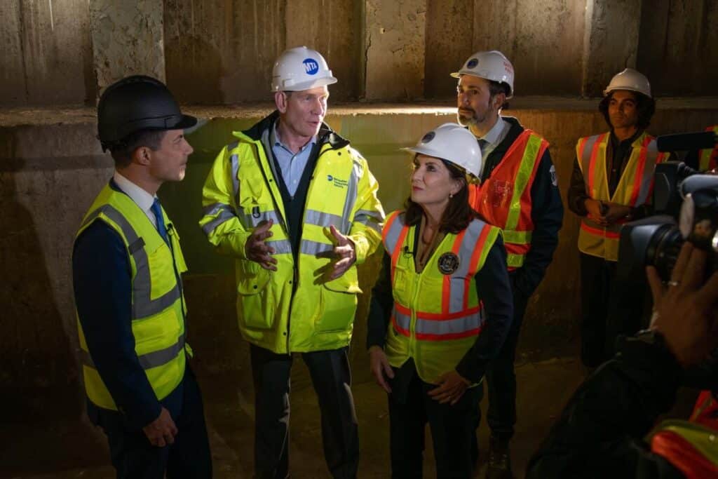 Photo of project engineers at a meeting to enhance work methods.