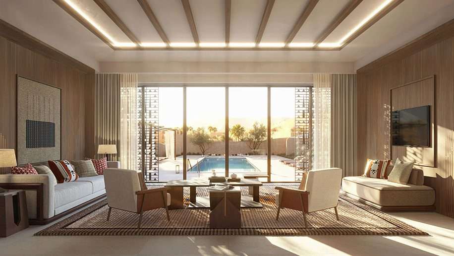 Aerial view of Wadi Safar villas integrated with the terrain and nearby golf course