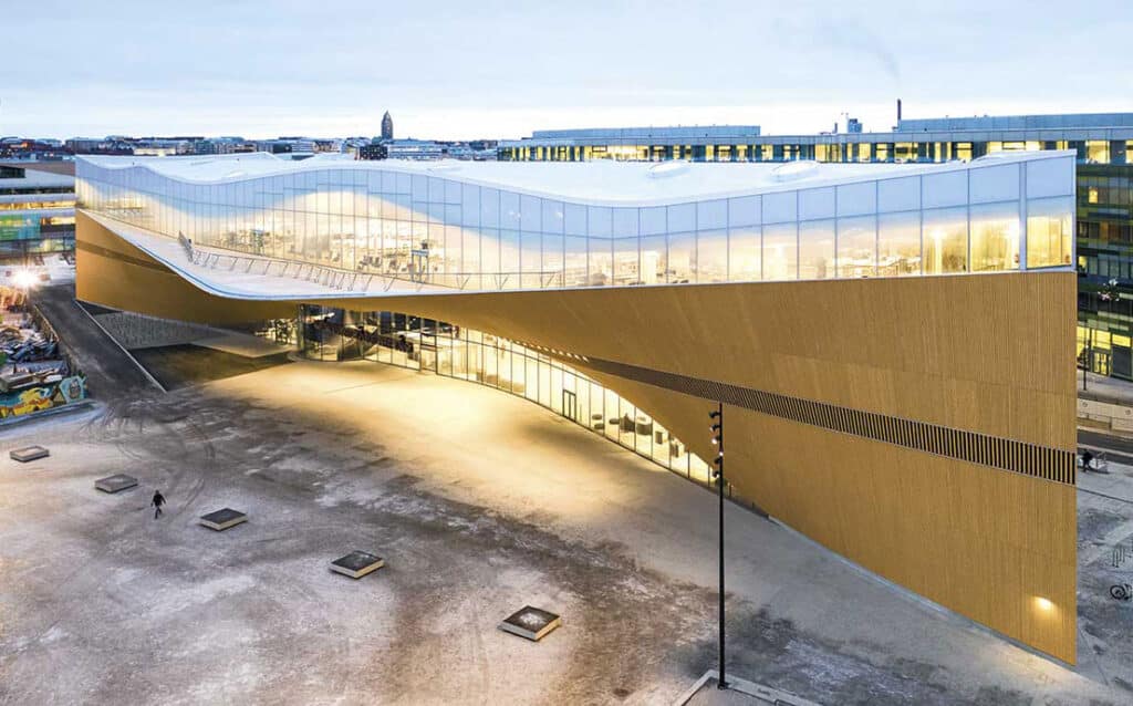Museum terraces overlooking the waterfront and exterior walkways.