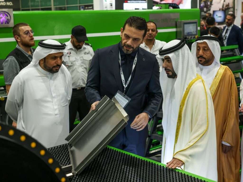 Visitors interacting with exhibitors, exploring the latest metalworking equipment and technologies.
