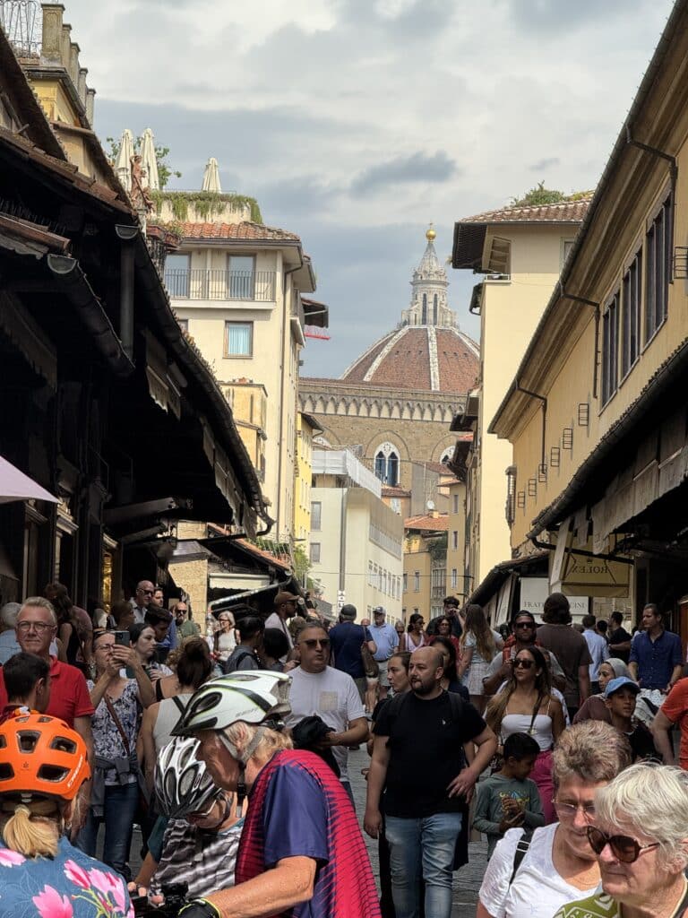 The bridge over the Arno river, showing the rows of shops built on it