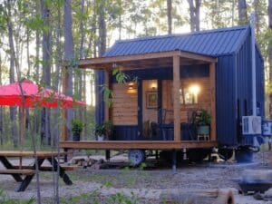 Exterior view of the Gunyah tiny mobile house, showcasing modern design and termite- and sun-resistant materials.