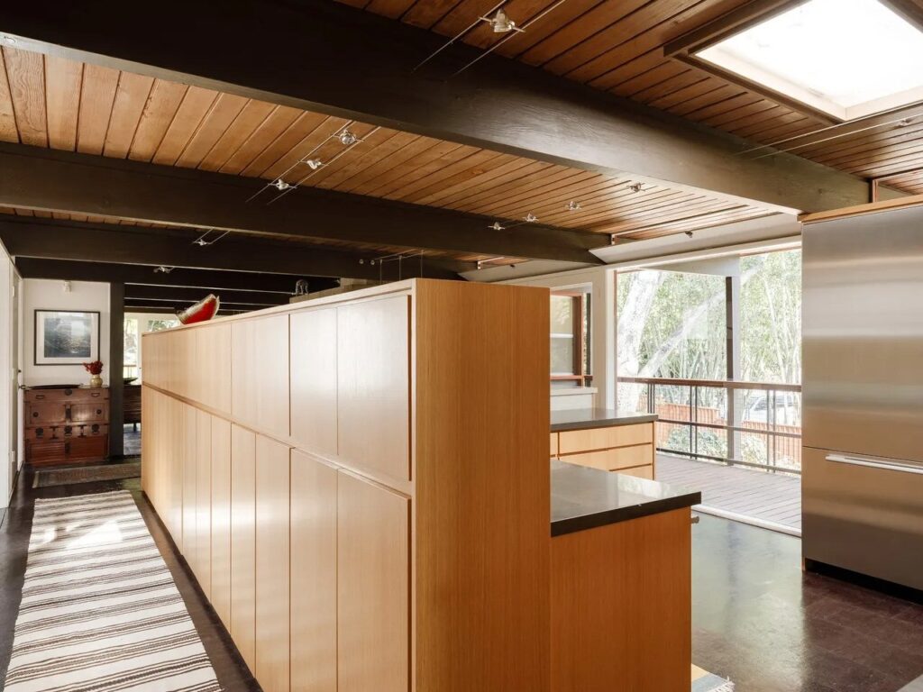 Norton House facade along a natural water stream