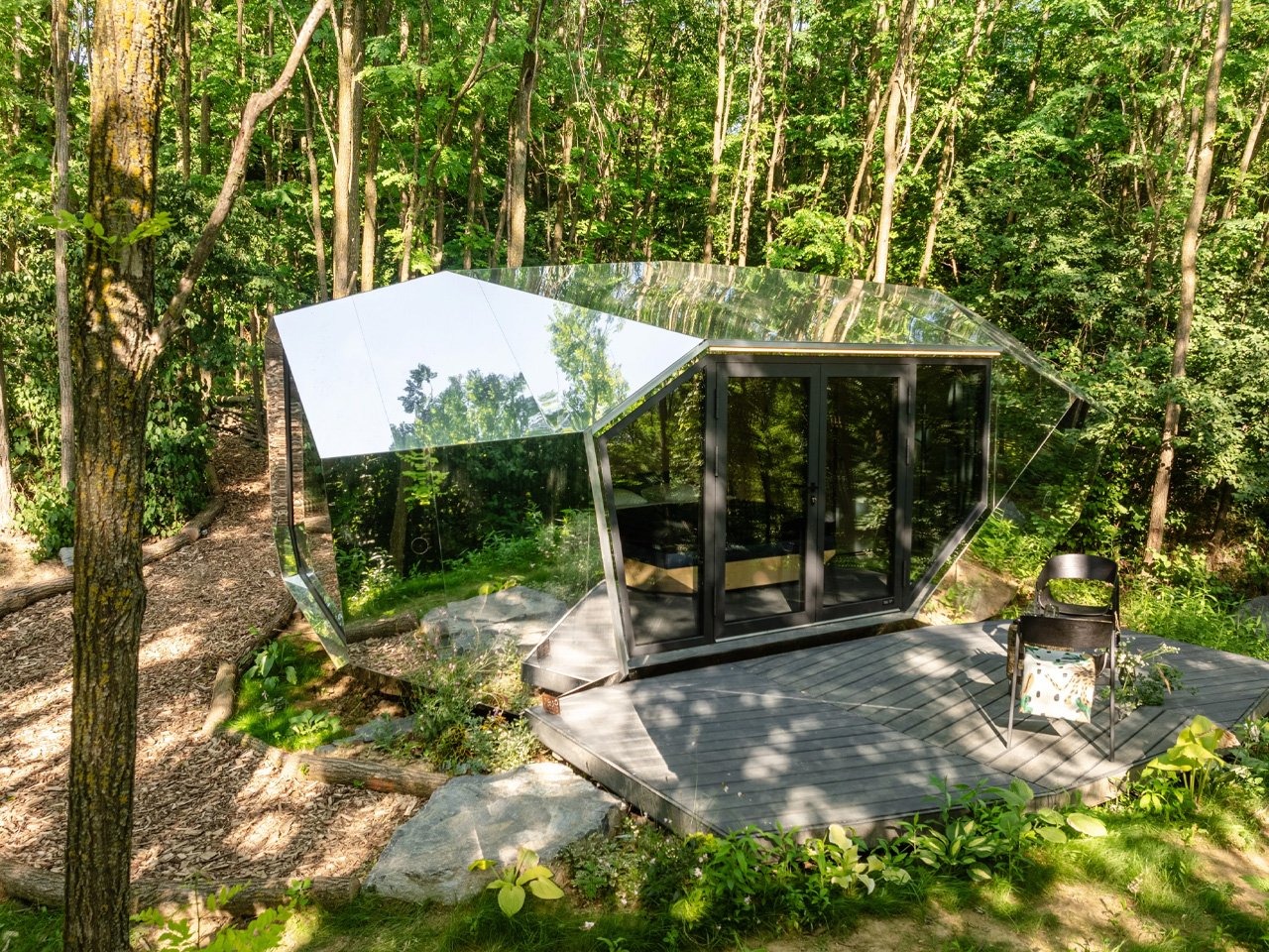 PEBL Grand multi-faceted cabin in a natural setting