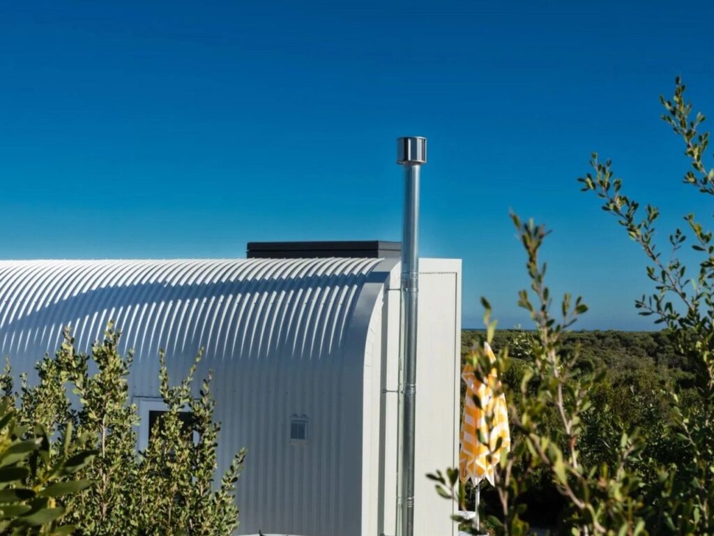 Integrated climbing wall leading to the loft in the small house