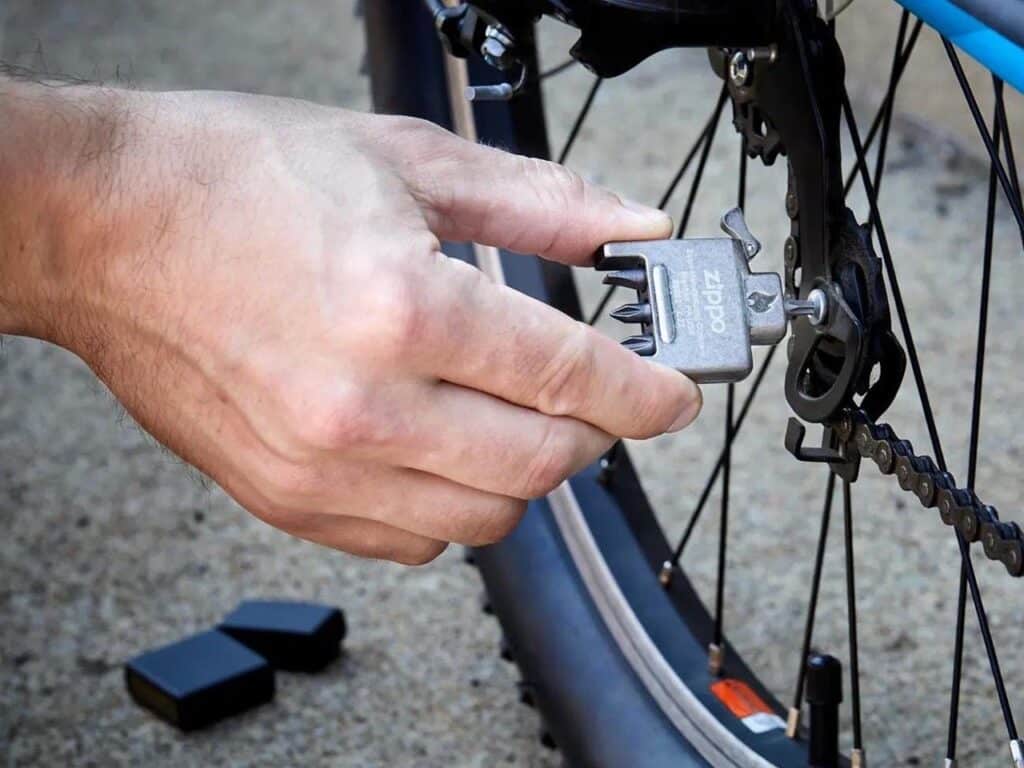 Bit Safe accessory in use for tightening screws on a device