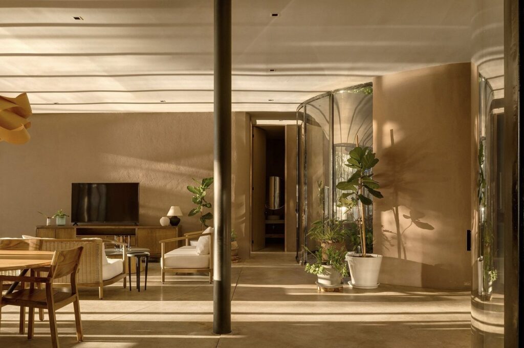 Casa Santa Maria del Oro architectural design on lakeside, blending modern architecture with natural surroundings