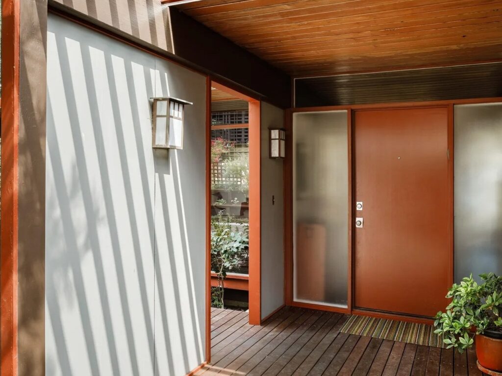 Norton House facade along a natural water stream